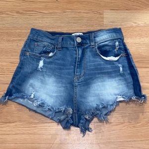short ripped cut off shorts
